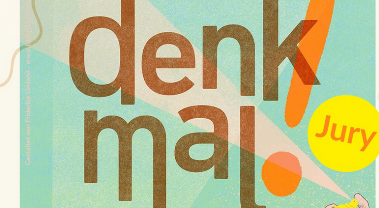 Farbiges Bild mit denkmal-Aufschrift